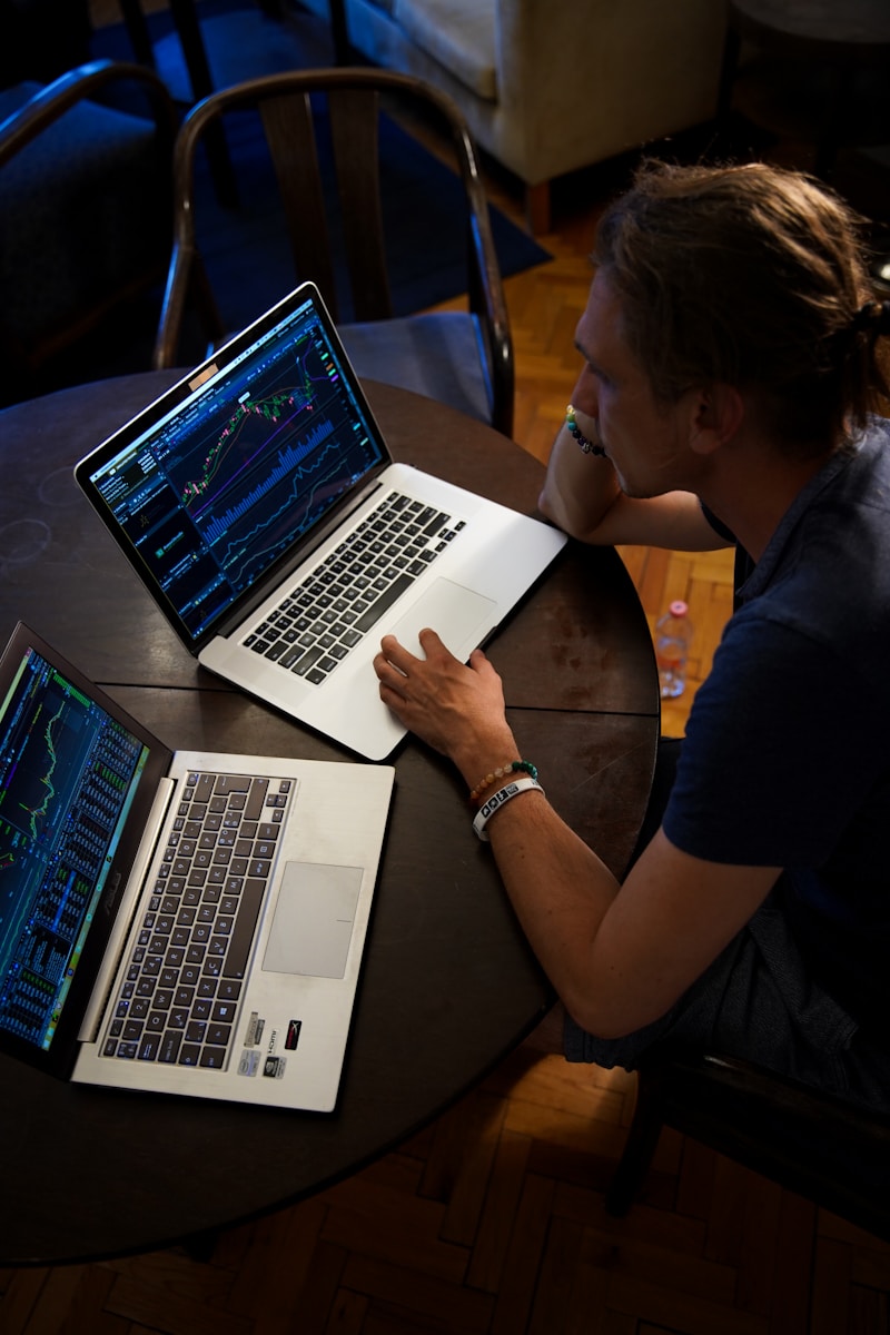 man sitting in front of the MacBook Pro, home insurance